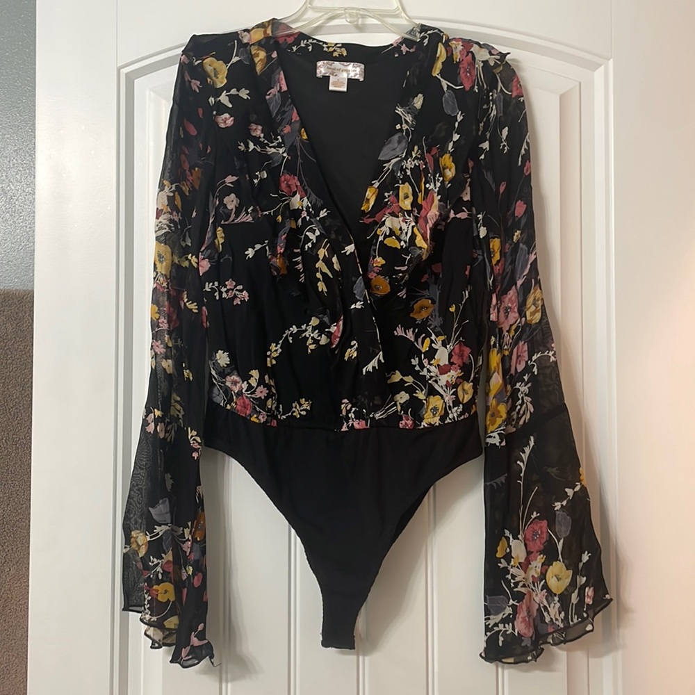 Band of gypsies body suit.